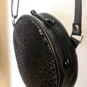 Sac Rond Noir, Motif brillant