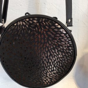 Sac Rond Noir, Motif brillant