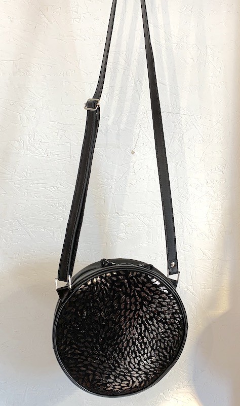 Sac Rond Noir, Motif brillant